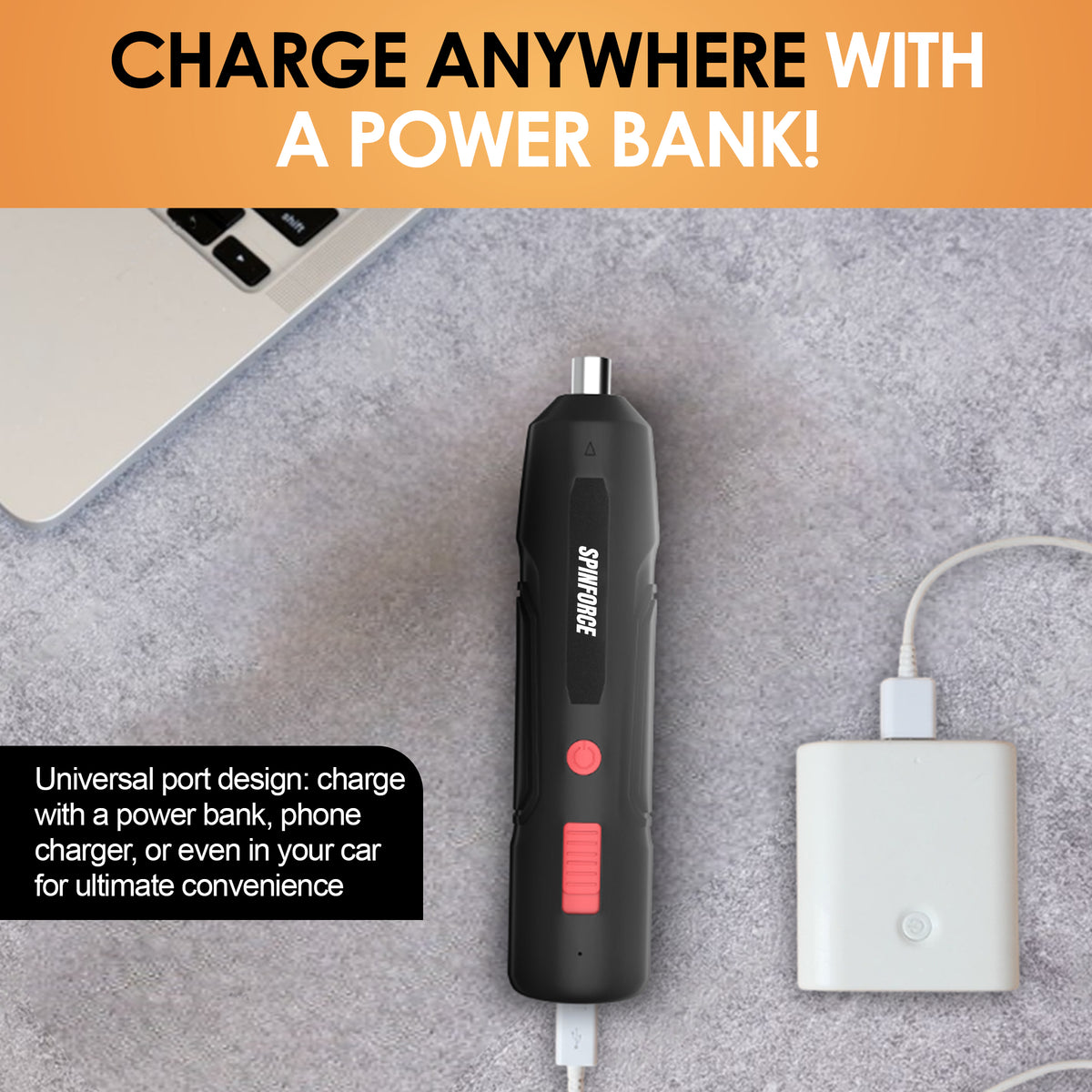 SpinForce cordless screwdriver charging by USB beside a power bank and laptop.